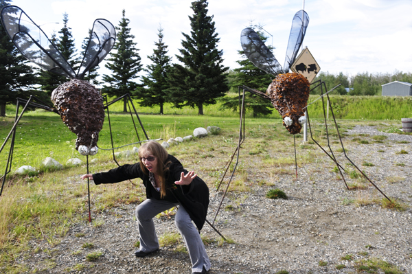 Karen Duquette gets away from two big mosquitos